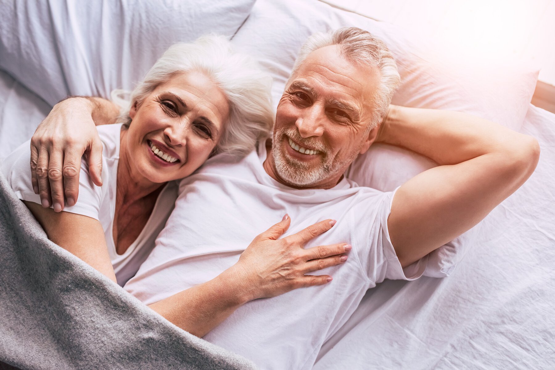 senior couple in bed together